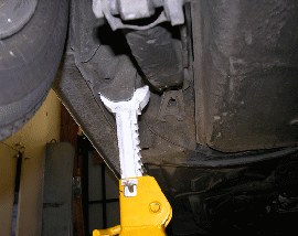 Placement of Jack Stand to Unload Output Shaft