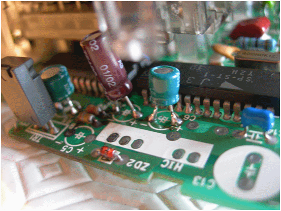 Resoldered Capacitors on 960 Speedo PCB