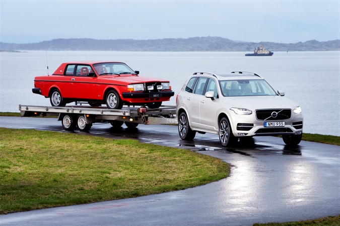 Pehr G Gyllenhammars 1981 Volvo 262C on a trailer behind the new XC90